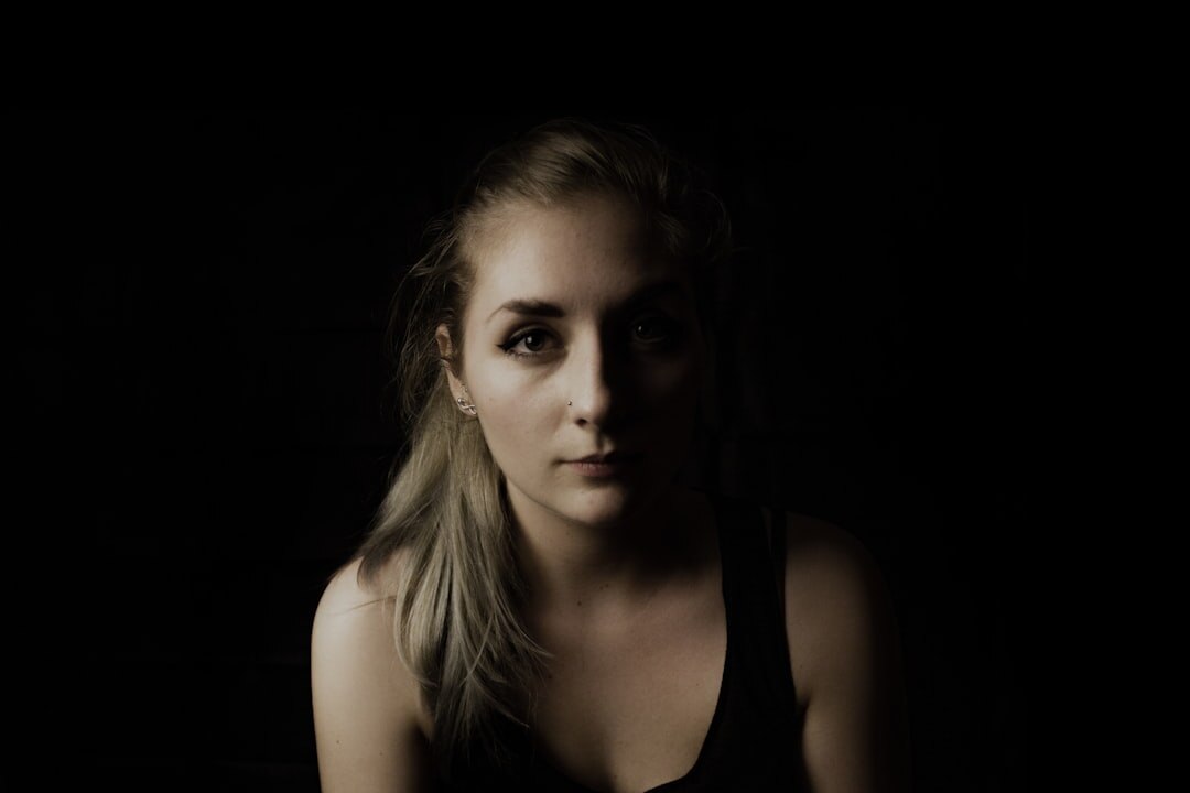 Studio portrait of a young woman with blonde hair