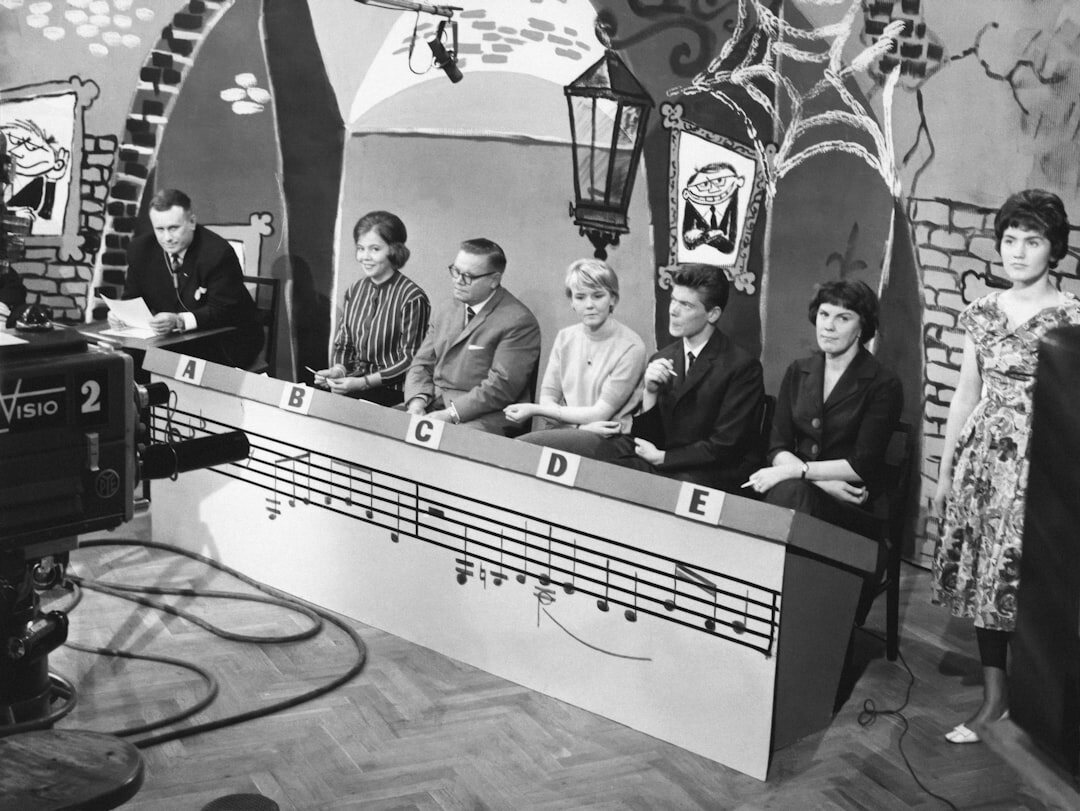 Television hosts presenting a studio program